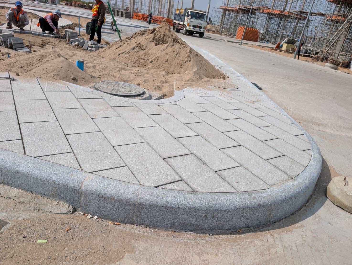 Granite kerbs and tree pits installation