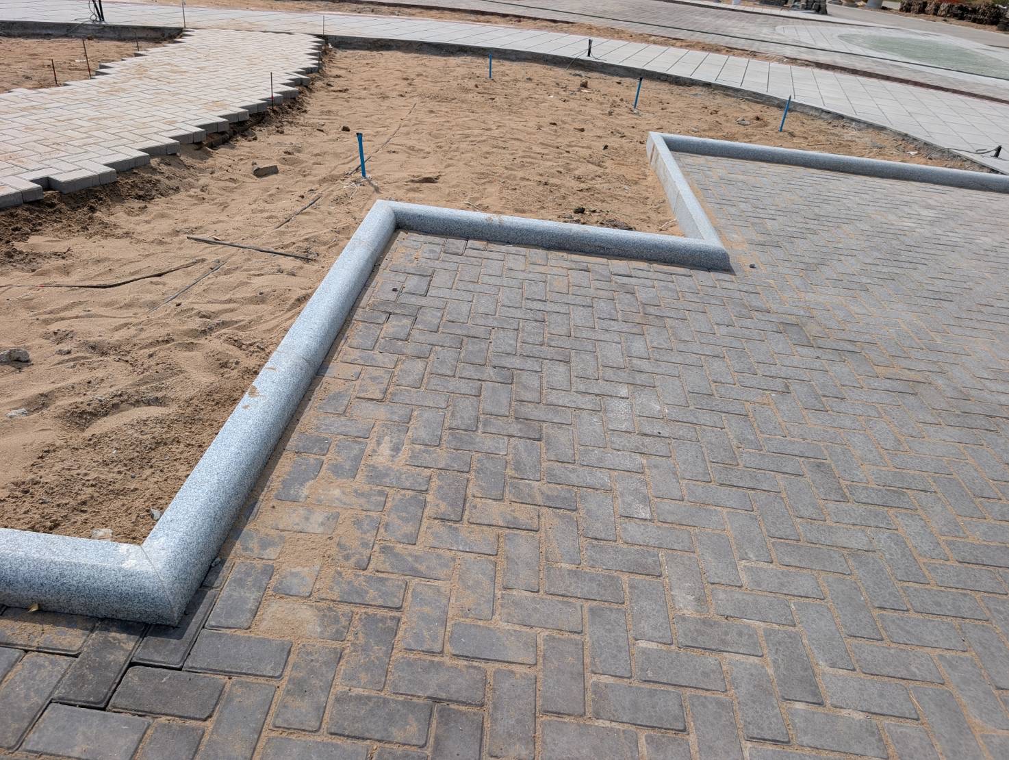 Granite kerbs and tree pits installation