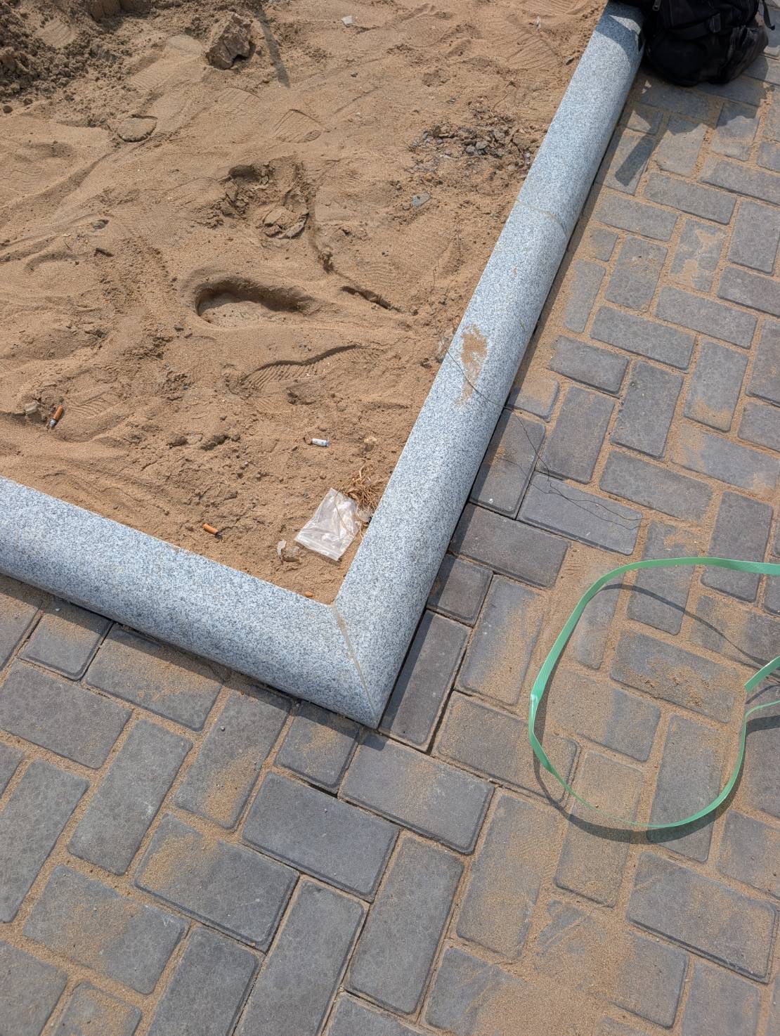 Granite kerbs and tree pits installation